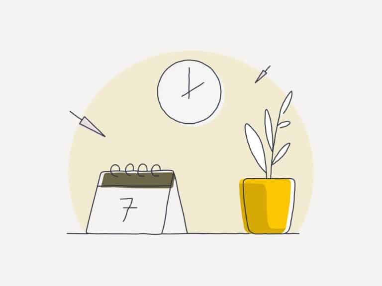 Desk calendar marked with 7, wall clock, and plant